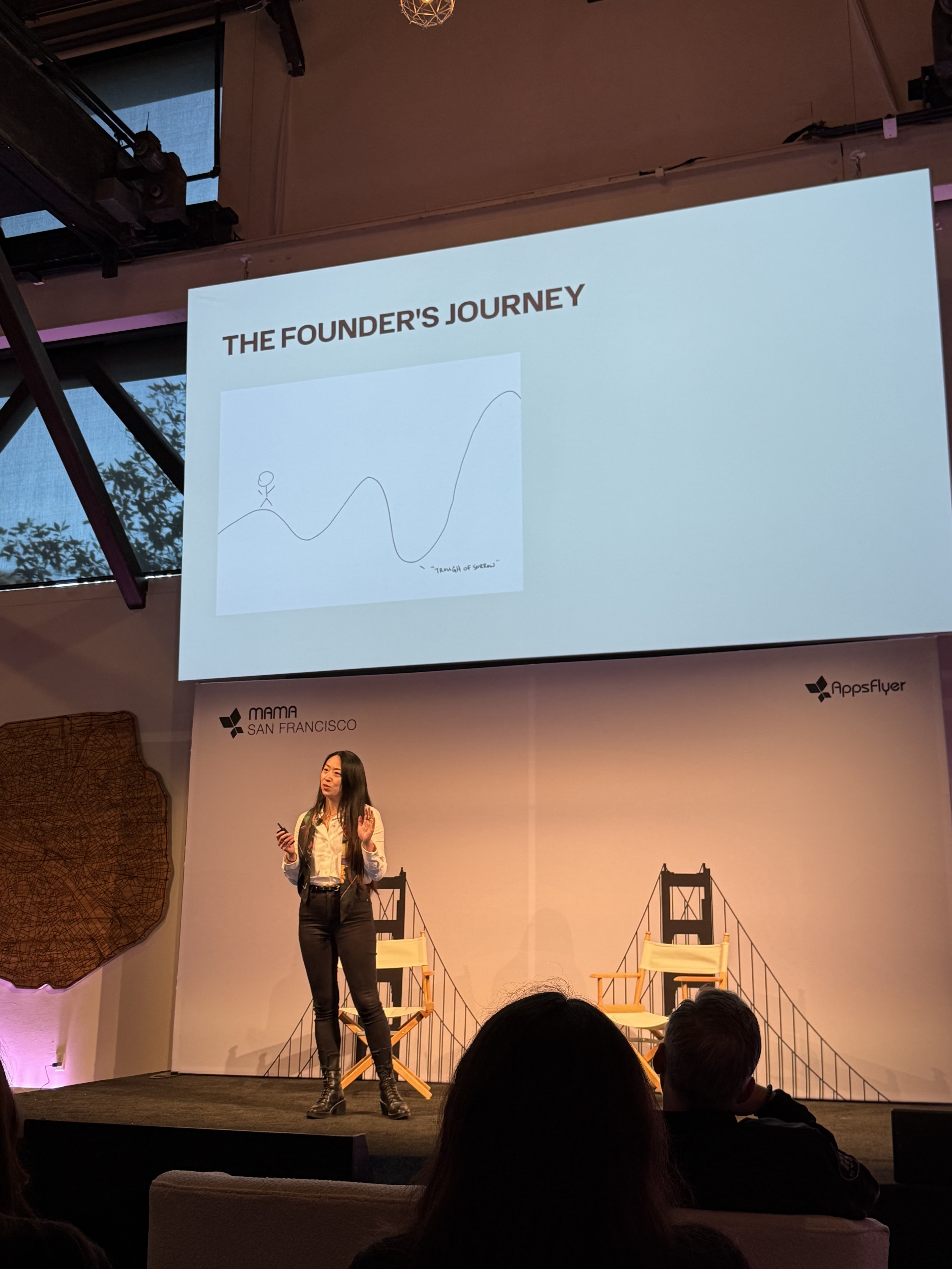 Susan Ho speaking on stage